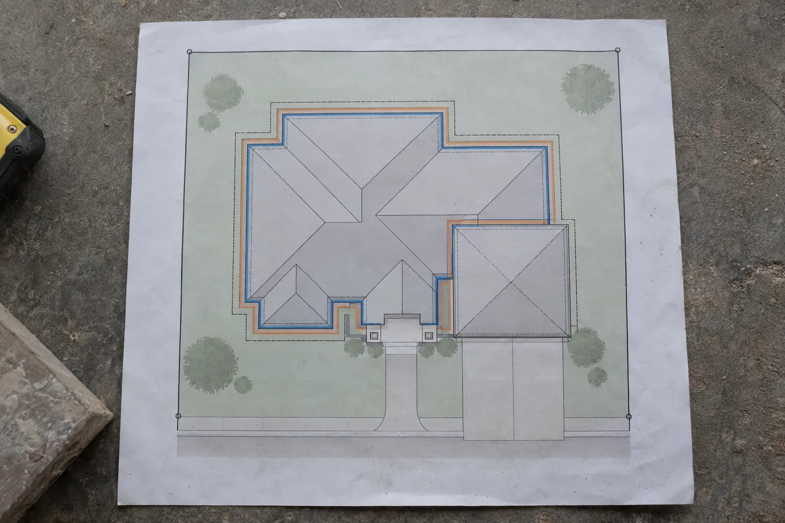 Bird's-eye schematic diagram of a single-story house floor plan with colour-coded zones highlighting the foundation perimeter, garage wall, roofline overhang, and crawl space edge on a plain grey background